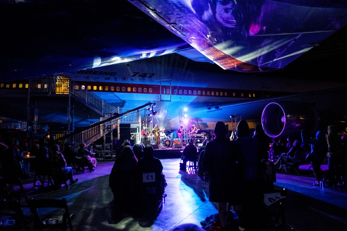 Underneath the wings of a Boeing 747, The Black Tones and Payge Turner play Seattle’s first concert in almost a year